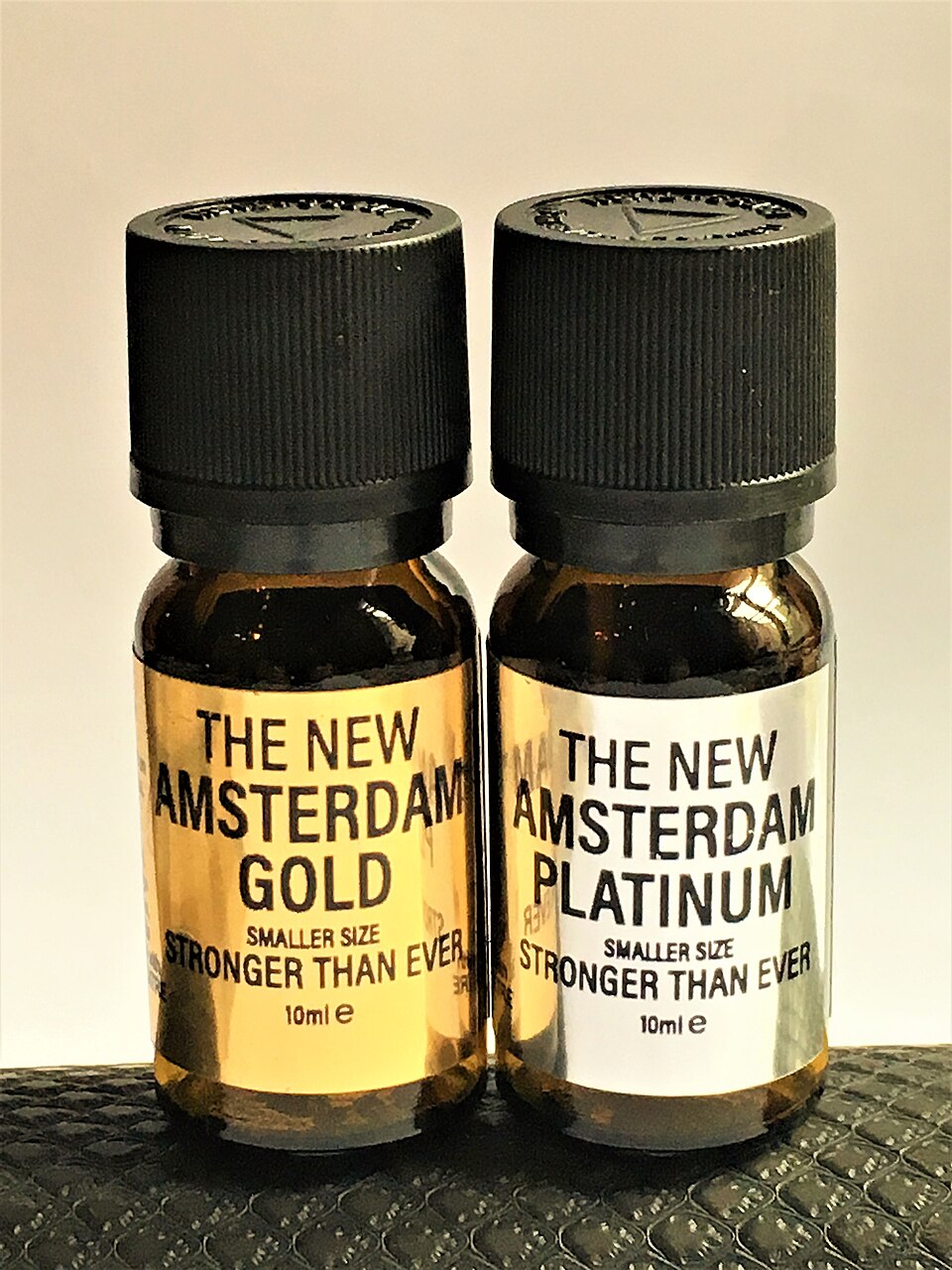 Bottles labeled as amyl nitrite inhalant products.